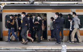 Commuters in Tokyo after Golden Week holiday period