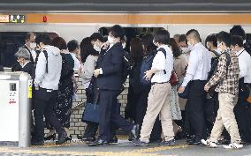 Commuters in Tokyo after Golden Week holiday period