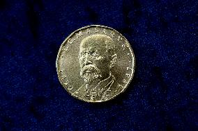 20-crown coin with portrait of Tomas Garrigue Masaryk