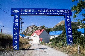 construction site of the Bar-Boljare motorway, highway, landscape, sign, gate, Chinese characters