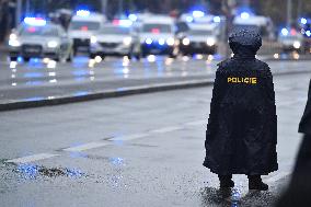 military parade on the occasion of 100th anniversary of Czechoslovakia's establishment, police, policeman in raincoat