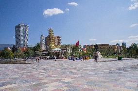 The Plaza Tirana hotel, Clock Tower, Hadji Et'hem Bey Mosque, Skanderbeg Square, carousel, Skanderbeg Monument e