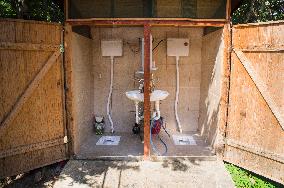 Prokletije National park, Mountains, outdoor squat toilet (flush toilet) with water cistern for flushing, WC, gents and ladies