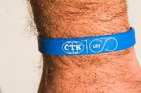 Printed Wristband Bracelet Silicone CTK 100 YEARS on a man`s hand