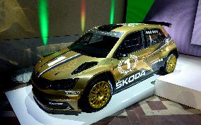 modernized rally car Skoda Fabia R5 by Skoda Motorsport, gold version