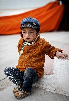 Ladakhi boy, traditional dress, Ladakh, Kashmir, India
