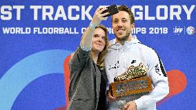 Pascal Meier (Switzerland) with the trophy for the Most useful player poses for a selfie with a fan