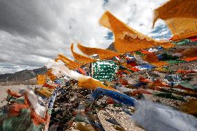 Buddhist prayer flags, Fatula pass, National highway 1D, road, road sign, mountains, Himalayas, Ladakh, Kashmir, India