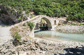 Hotova National Park, Benje thermal baths, Lengarica River Canyon, typical Ottoman Katiu Bridge