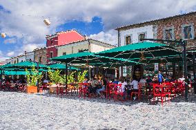 Korce (Korca) town center, restaurant, tourists