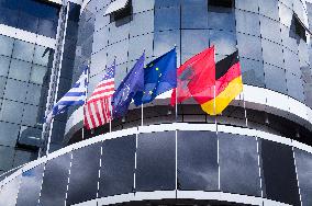 Korce (Korca) town, Hotel Kocibelli, flags of Greece, USA, NATO, EU, Albania, Germany