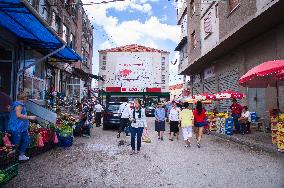 Korce (Korca) town, street selling, Spar food retail store