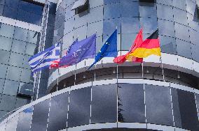 Korce (Korca) town, Hotel Kocibelli, flags of Greece, USA, NATO, EU, Albania, Germany