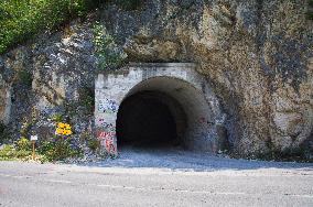 road tunnel in the Piva River canyon, Trsa, Zabljak direction sign