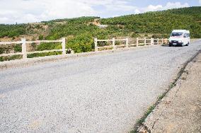 damaged bridge with SH6 road