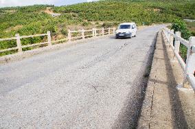 damaged bridge with SH6 road