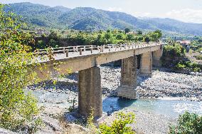 damaged bridge with SH75 road, confluence between Lengarica and Viosa River