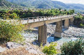 damaged bridge with SH75 road, confluence between Lengarica and Viosa River