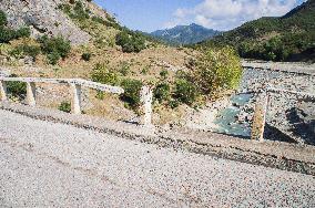 damaged bridge with SH75 road, surface, top, hole, confluence between Lengarica and Viosa River