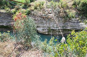 Viosa River, damaged, ruined rope bridge