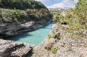 Viosa River, damaged, ruined rope bridge, steel construction bridge