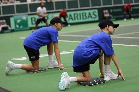 Tennis ball girl and boy