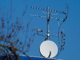 Antennas on a blue sky background