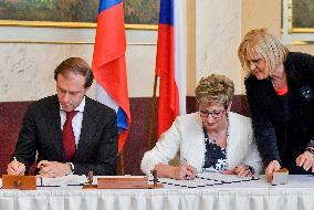 Marta Novakova, Denis Manturov