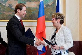 Marta Novakova, Denis Manturov