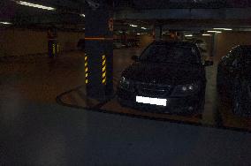 car in underground shopping mall garage