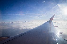 easyJet plane Airbus A320, clouds