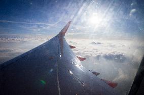 easyJet plane Airbus A320, clouds