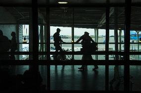 Schiphol Airport, Amsterdam, heavy armed policemen patrol, safety precautions