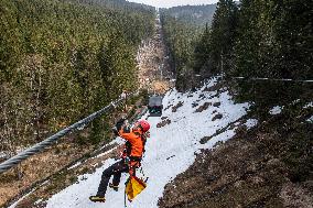 joint exercise of Czech and Polish firefighters on chairlift to Snezka Mountain in the Giant Mountains (Krkonose)