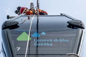 joint exercise of Czech and Polish firefighters on chairlift to Snezka Mountain in the Giant Mountains (Krkonose)