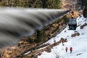 joint exercise of Czech and Polish firefighters on chairlift to Snezka Mountain in the Giant Mountains (Krkonose)