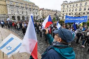 rally protesting and warning against the danger of anti-Semitism, Israeli and Czech flag