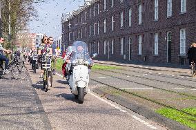 bicyclist in Amsterdam, motorbike, scooter