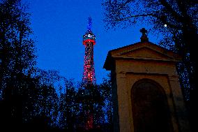 The lookout tower on Petrin hill lit in the French national colours