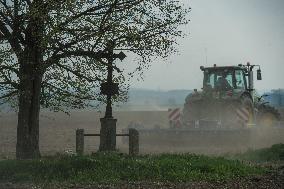 dry soil in the fields, farmer, farming, tractor