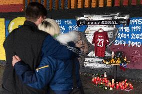 people light candles in memory of Josef Sural