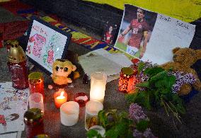 people light candles in memory of Josef Sural