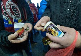 people light candles in memory of Josef Sural