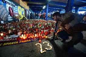 people light candles in memory of Josef Sural