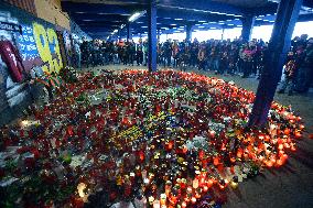 people light candles in memory of Josef Sural