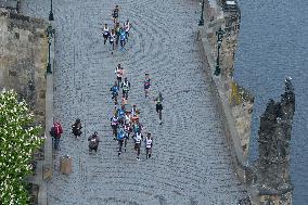 Runners, athletes, Prague International Marathon, Charles Bridge