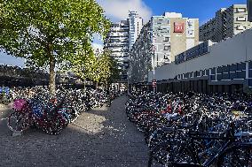 Amsterdam, center of the city, bikes, bicycles, parking, people, tourist, tourists, tourism