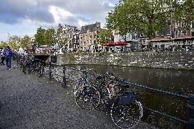 Amsterdam, center of the city, bikes, bicycles, parking, people, tourist, tourists, tourism