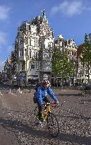 Amsterdam, center of the city, bikes, bicycles, parking, people, tourist, tourists, tourism