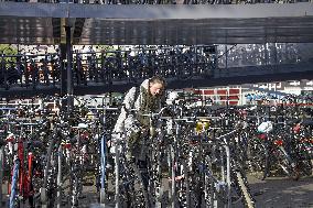 Amsterdam, center of the city, bikes, bicycles, parking, people, tourist, tourists, tourism